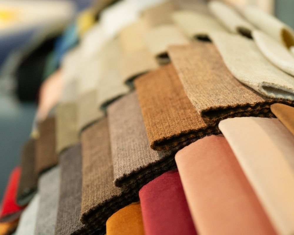 Upclose image oof fabric samples.