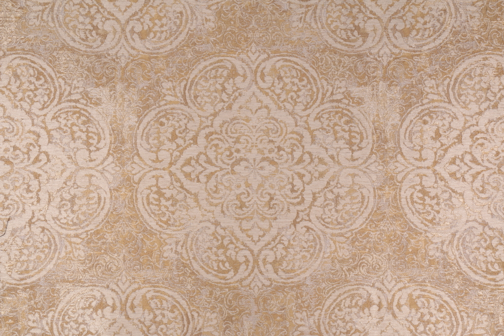 Covington Vogue Damask Woven Upholstery Fabric in 820 Empire Gold