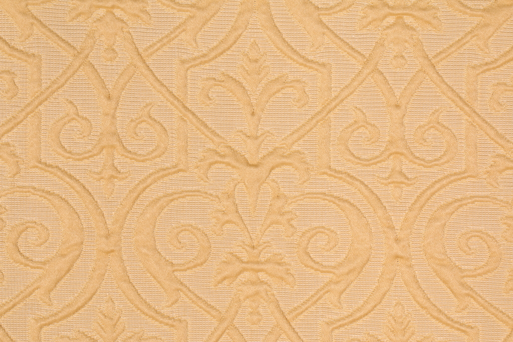 Manilow Matelasse Upholstery Fabric in Gold