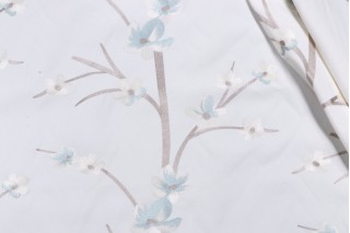 Juanita Floral Embroidered Drapery Fabric in Aquamist