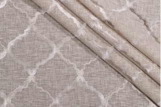 Davis Embroidered Drapery Fabric in Taupe