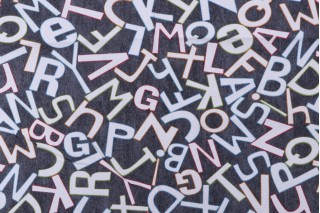 Waverly Alphabets Printed Cotton Drapery Fabric in Noir