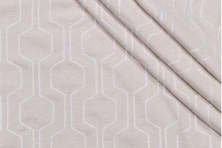 Takeoff Embroidered Drapery Fabric in Bisque