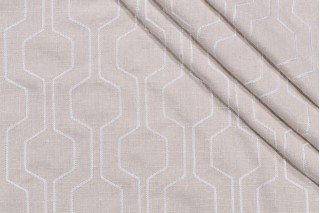 Takeoff Embroidered Drapery Fabric in Bisque
