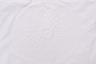 Aristica Matelasse Upholstery Fabric in Angora