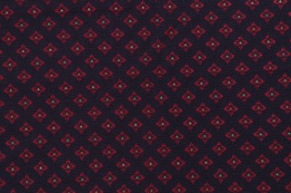 Scalamandre Stella Geometric Woven Upholstery Fabric in Red on Navy