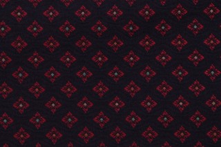Scalamandre Stella Geometric Woven Upholstery Fabric in Red on Navy