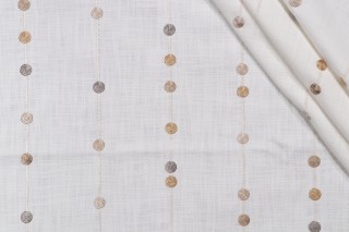 Amistoso Embroidered Drapery Fabric in Natural