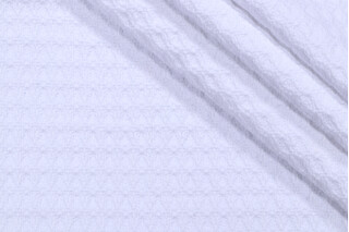 Pebble Beach Woven Upholstery Fabric in Bleach