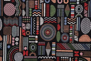 Covington Hieroglyphics Embroidered Drapery Fabric in 150-Mardi Gras 
