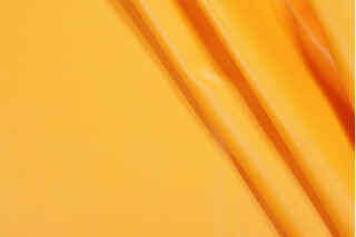 Scalamandre Polaris Vinyl Upholstery Fabric in Curry