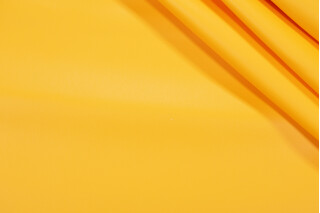Scalamandre Polaris Vinyl Upholstery Fabric in Mango
