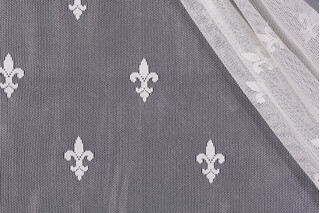 Fleur De Lis Embroidered Sheer Drapery Fabric in Ivory