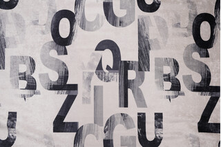 Alphabet City Printed Chenille Upholstery Fabric in New York City