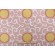 Sun Spotted Woven Upholstery Fabric in Coral