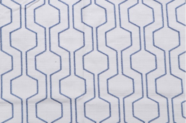 Takeoff Embroidered Drapery Fabric in Ocean