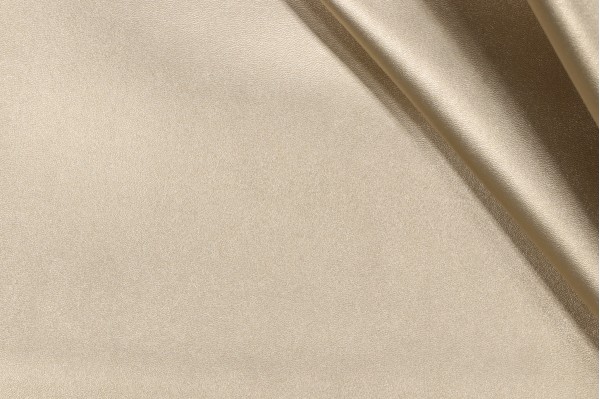 Tuscan Vinyl Upholstery Fabric in Gold