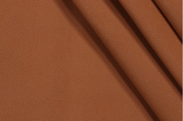 Click for 1.13 Yards Scalamandre Pebble Beach Vinyl Upholstery Fabric in Saddle Scalamandre Pebble Beach Vinyl Upholstery Fabric in Saddle