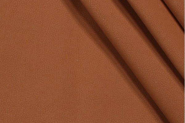 Click for 1.13 Yards Scalamandre Pebble Beach Vinyl Upholstery Fabric in Saddle Scalamandre Pebble Beach Vinyl Upholstery Fabric in Saddle