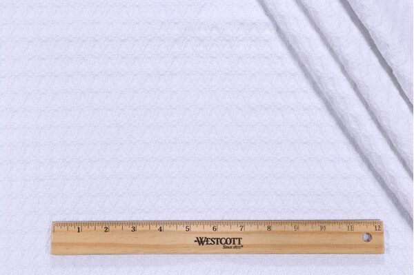 Pebble Beach Woven Upholstery Fabric in Bleach