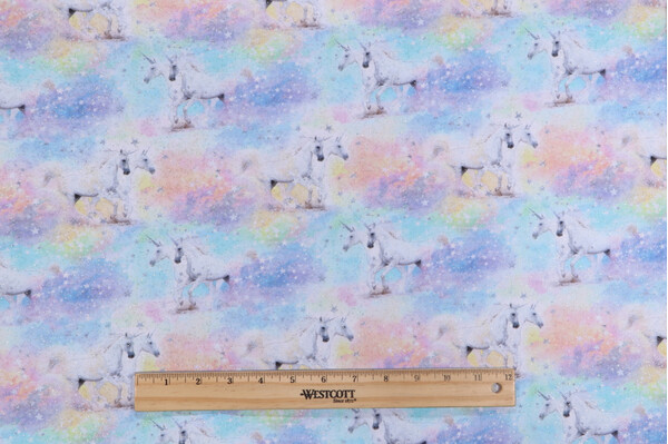Timeless Treasures Unicorns & Stars Met Printed Cotton Craft Fabric in Pastel