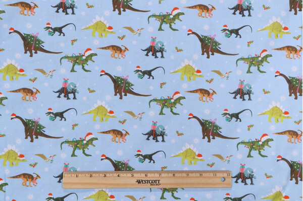 Timeless Treasures Santa-Saurus - Dinosaurs Santa Printed Cotton Craft Fabric in Blue