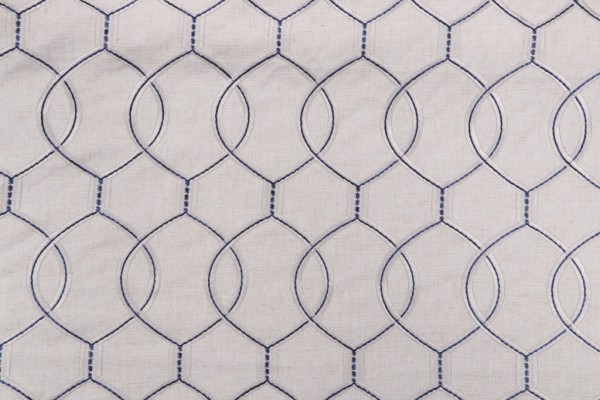 Hourglass Embroidered Drapery Fabric in Bluestone