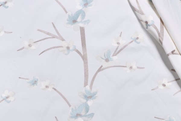 Juanita Floral Embroidered Drapery Fabric in Aquamist