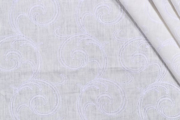 Onassis Embroidered Semi-Sheer Drapery Fabric in Whisper
