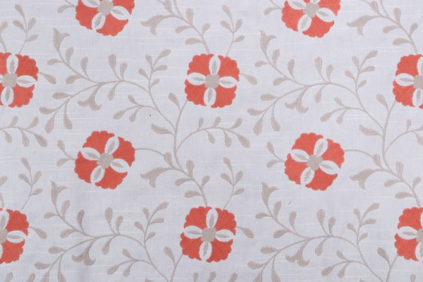 Diwan Embroidered Drapery Fabric in Coral Reed