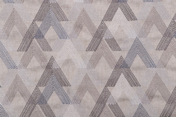 Arrowhead Embroidered Drapery Fabric in Tundra