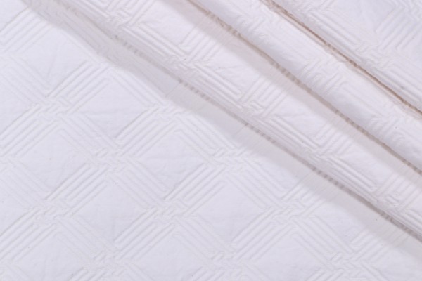 Noel Matelasse Upholstery Fabric in Angora