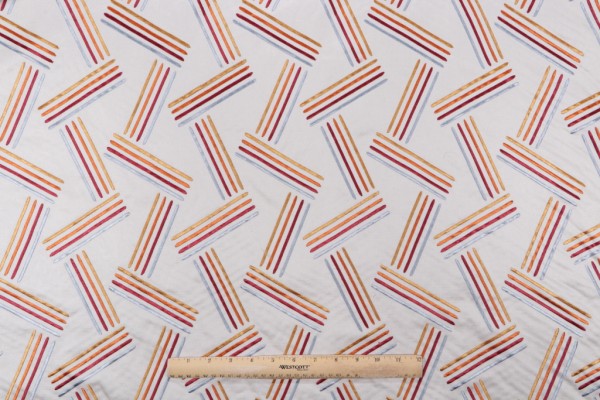 Cayson Embroidered Decorator Fabric in Sunset 