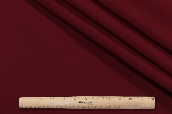 SunReal Solid Canvas Woven Solution Dyed Acrylic Outdoor Fabric in Burgundy 