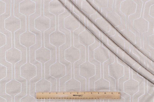 Takeoff Embroidered Drapery Fabric in Bisque