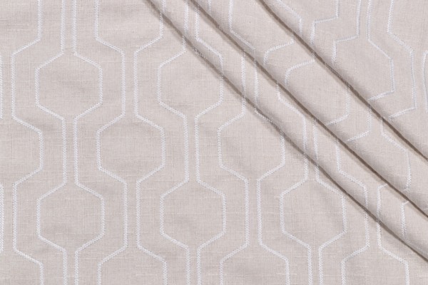 Takeoff Embroidered Drapery Fabric in Bisque