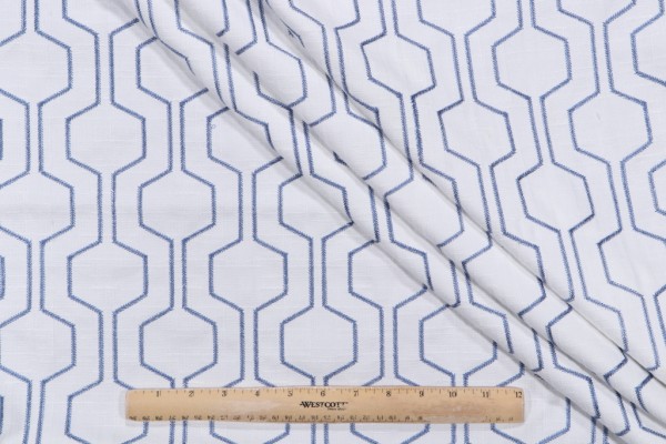 Takeoff Embroidered Drapery Fabric in Ocean