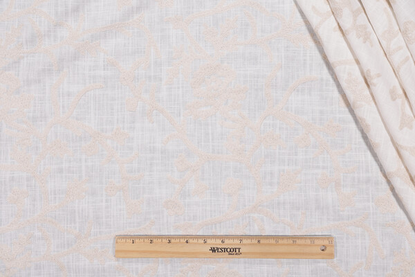 Whistler Semi-Sheer Embroidered Drapery Fabric in Snowflake