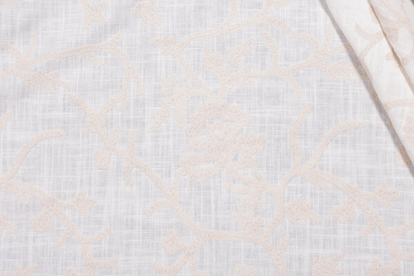 Whistler Semi-Sheer Embroidered Drapery Fabric in Snowflake