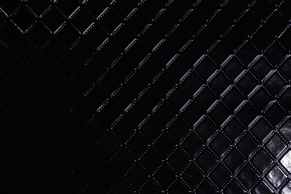 Scalamandre Mademoiselle&#39;s Quilt Embossed Vinyl Upholstery Fabric in Noir