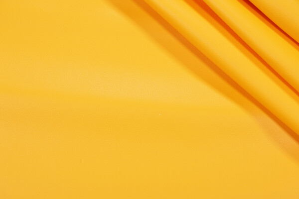 Scalamandre Polaris Vinyl Upholstery Fabric in Mango
