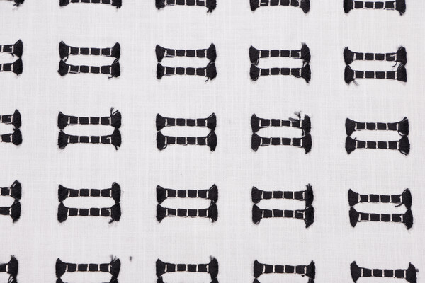 Kvasto Embroidered Drapery Fabric in Tuxedo