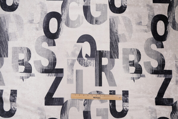 Alphabet City Printed Chenille Upholstery Fabric in New York City
